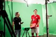 MUNICH, BAVARIA - AUGUST 10:  Mats Hummels (R) is seen in a recording studio during the DFL Media Day on August, 10, 2016 in Munich, Germany.  (Photo by Jan Hetfleisch/Getty Images For DFL)